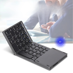 Foldable Bluetooth keyboard in chic grey design, featuring a built-in touchpad, compatible with Windows, Android, and iOS devices.